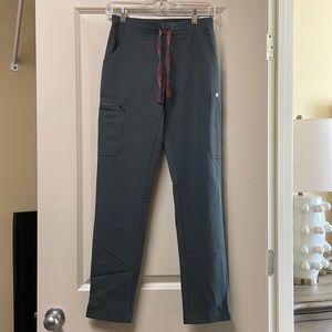 Figs yola skinny scrub pants. NWT. Color: Bonsai